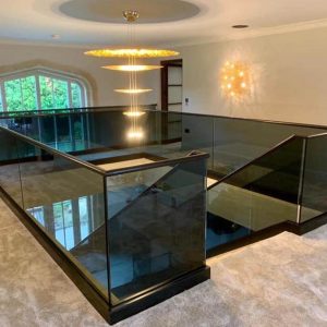 Black glass staircase with dark glass balustrades stairs
