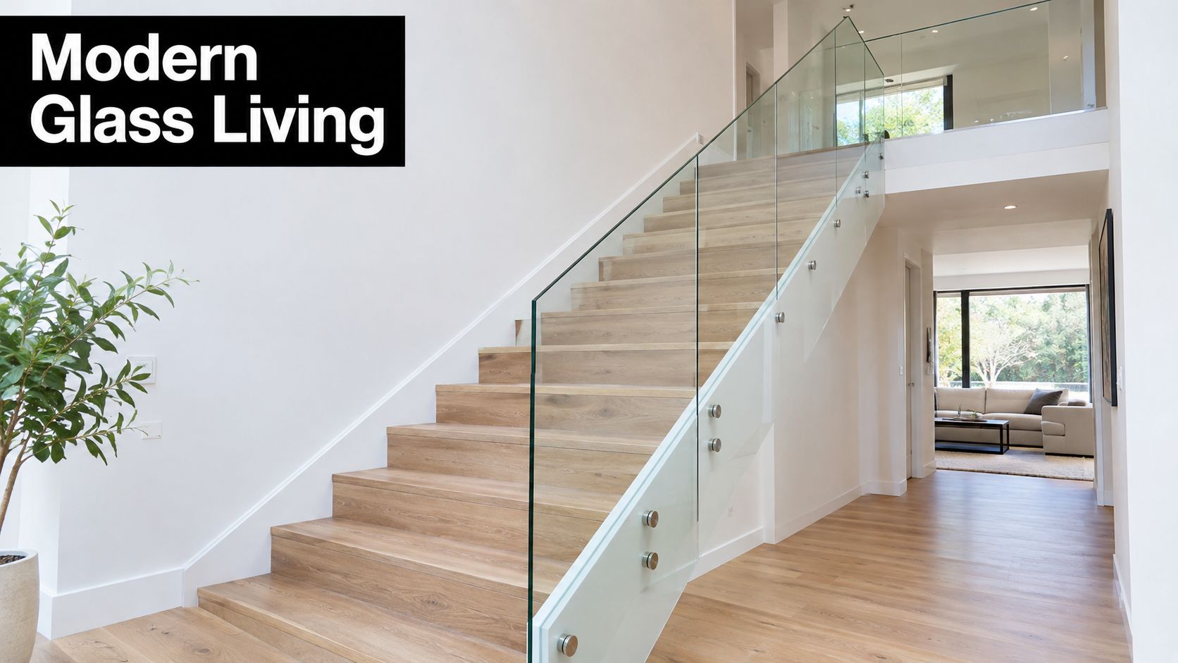 A modern staircase featuring light wood steps and a sleek frameless glass balustrade in a bright home.